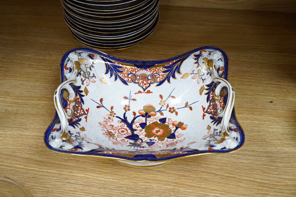 An early 19th century Derby Imari porcelain dessert service, two handled fruit dish 29cm wide
